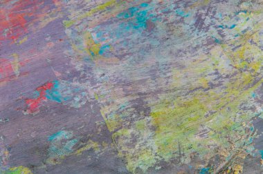 Renkli yaratıcı arkaplan: Ahşap bir palette yağlı boya kalıntıları, kısa odak, seçici bulanık