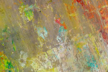 Renkli yaratıcı arkaplan: Ahşap bir palette yağlı boya kalıntıları, kısa odak, seçici bulanık