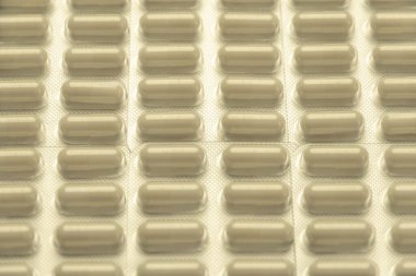 arka plan için, düşük kontrastlı, bulanık efektli, tonlu, kısa odaklı birçok hap sıralanmıştır.