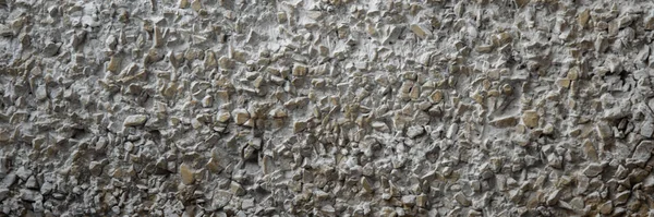 decorative coating with fine stone abrasive, dark background