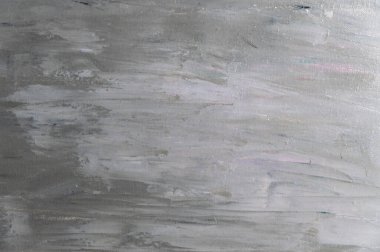 Çamaşır bezi üzerine bulaşmış yağlı boya lekesinden soyut gri arkaplan