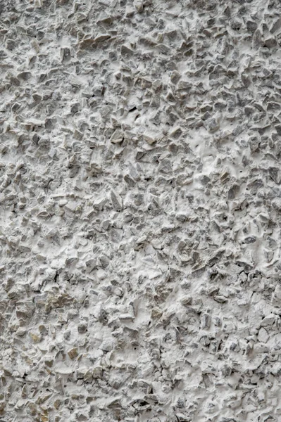 decorative coating with fine stone abrasive, light background