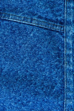 Klasik grunge arkaplan: gerçek eski Amerikan kotu, yakın, yara izi ve iplik, kısa odak, üst görünüm