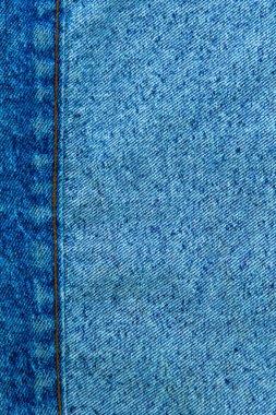 Klasik grunge arkaplan: gerçek eski Amerikan kotu, yakın, yara izi ve iplik, kısa odak, üst görünüm