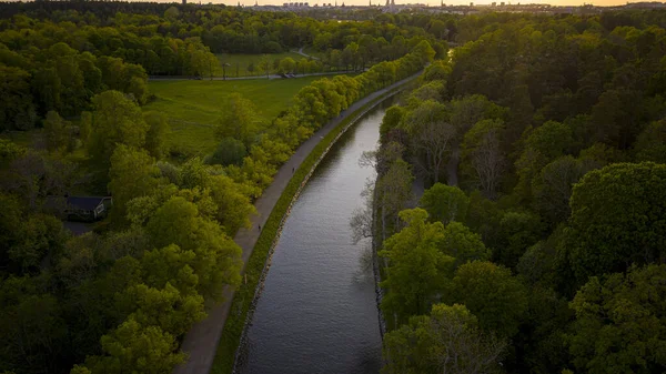 Sunset over canal in a park in Stockholm Sweden — Stock Photo, Image