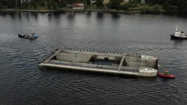 Transportation of a new sluice, to Guldbron in the archipelago of Stockholm. 2020-06-29 — Stock Video
