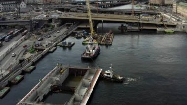 Stockholm takımadasındaki Guldbron 'a yeni bir kanalizasyon nakli. 2020-06-29