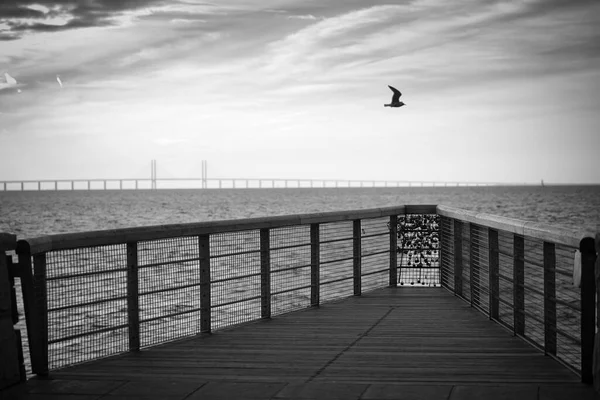 210501 Malmo Sweden - Sunset over pier of love locks — стокове фото