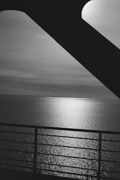 Copenhagen, Denmark - Juli 1, 2020 Black and white photo taken from train on Oresundsbron. — стокове фото