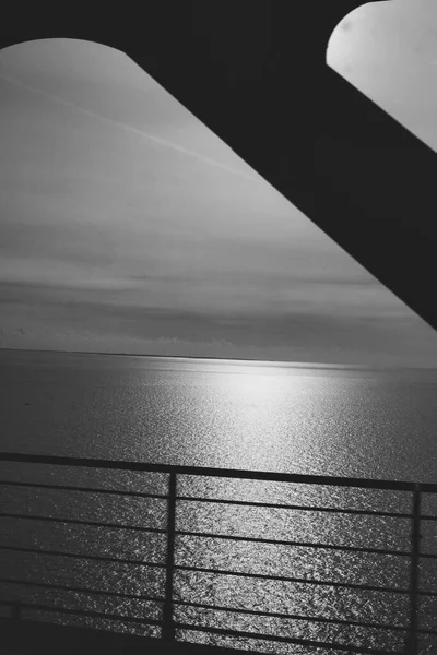 Copenhagen, Denmark - Juli 1, 2020 Black and white photo taken from train on Oresundsbron. — стокове фото