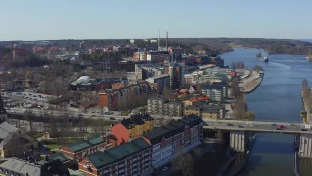 stock video Drone footage of Sodertalje canal and Sodertalje city in Sweden on a sunny day in April 18.4-21