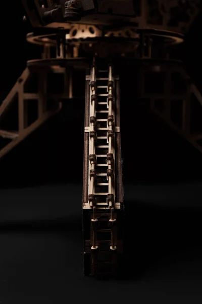 Port crane made of wood on a black background — Stock Photo, Image