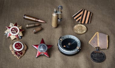 orders, medals, compass, lighter, live ammunition clipart