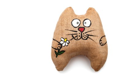 toy - cat holding a flower in his paw clipart