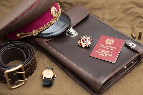 Nature morte avec des objets vintage dédiés au Jour de la Victoire. Ordre de la guerre patriotique de première classe. 9 mai — Photo