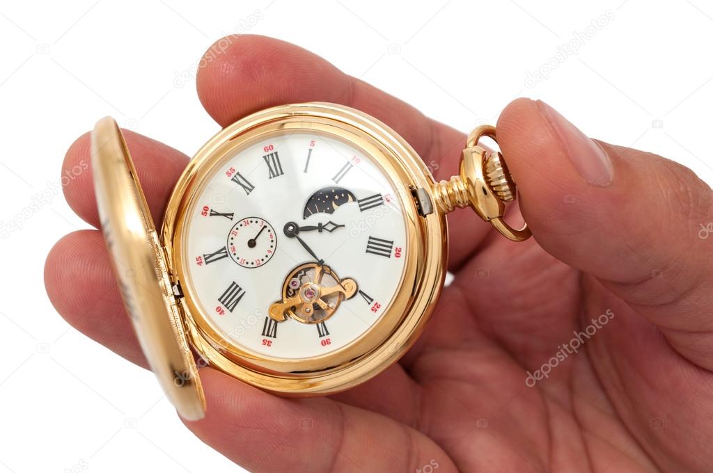 hand holding pocketwatch gold