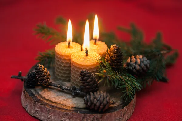 Decorative christmas composition with burning candles — Stock Photo, Image