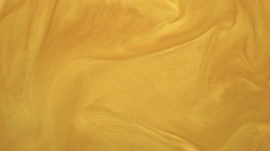 Altın parıltısı soyut bir lüks.