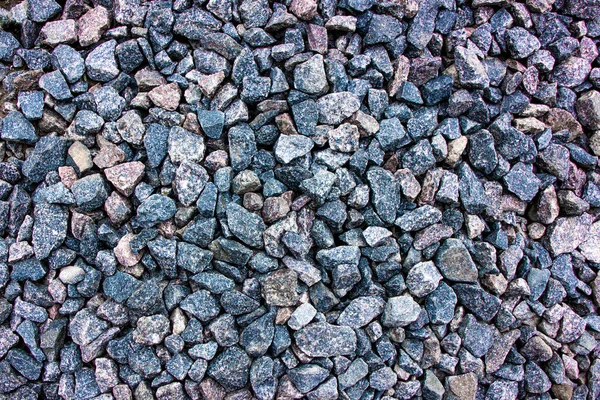 Pierre concassée de couleur bleue. beaucoup de pierres — Photo