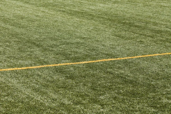 football pitch with yellow lines