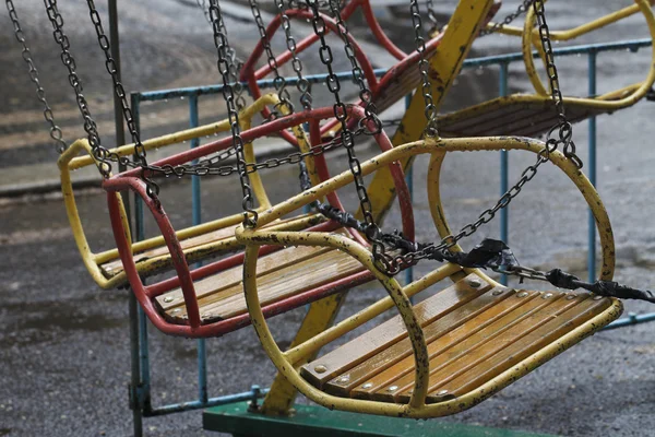 Vintage swing in the rain — Stock Photo, Image