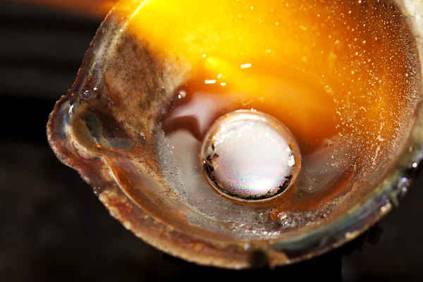 Melting silver in a jewelry workshop — Stock Photo, Image