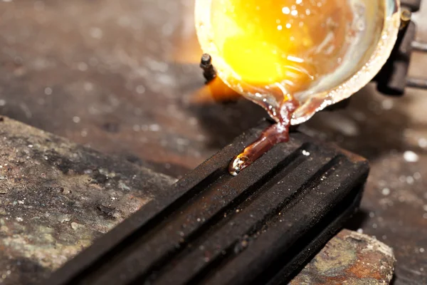 Melting silver in a jewelry workshop — Stock Photo, Image