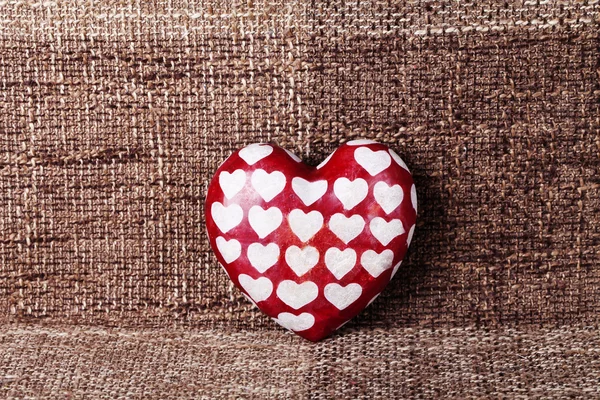 Red heart on a brown background — Stock Photo, Image