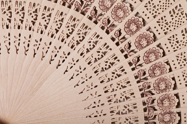 Wooden fan close-up geometric pattern — Stock Photo, Image
