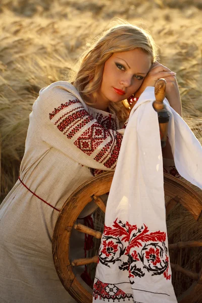 Beautiful young Ukrainian girl in traditional dress — Stock Photo, Image