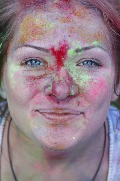 Happy young girl on the Holi festival — Stock Photo, Image