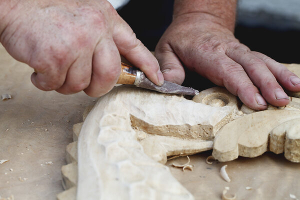 wood carvings, tools and processes work closeup