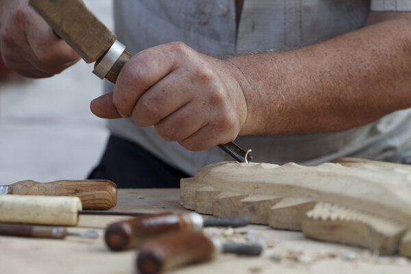 wood carvings, tools and processes work closeup