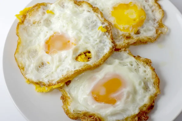 Tres huevos fritos — Foto de Stock