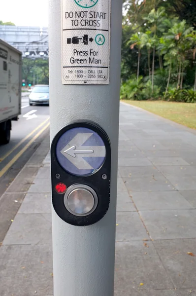 Arrow and button to press for Pedestrian Crossing — Stock Photo, Image