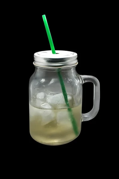 Ice beverage in glass mug with metal lid — Stock Photo, Image