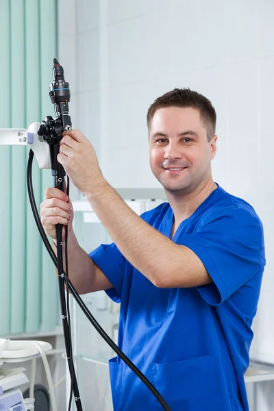 Male doctor endoscopist is preparing to receive patients — Stock Photo, Image