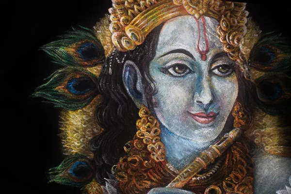 Krishna-Kopf mit Pfauenfeder und Schmuck, handbemalt — Stockfoto