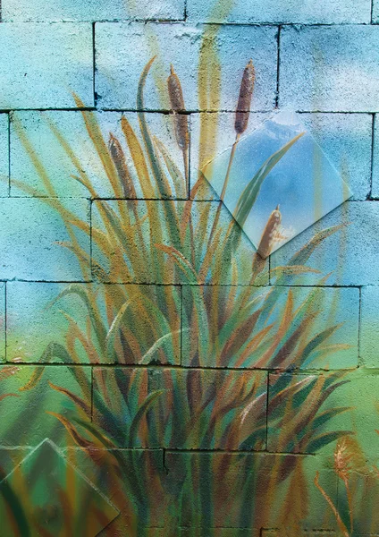 Grono dzikie trzciny trzcina namalowane na ścianie — Zdjęcie stockowe