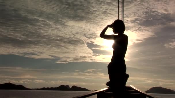 Woman at the bow of a ship — Stock Video