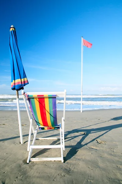Colorful deck chair on beach — Stock Photo, Image