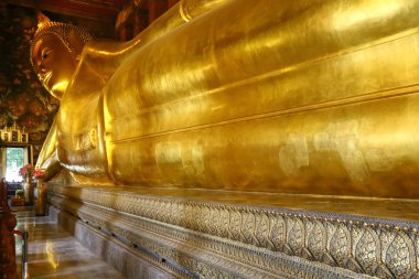The giant golden statue of reclining Buddha