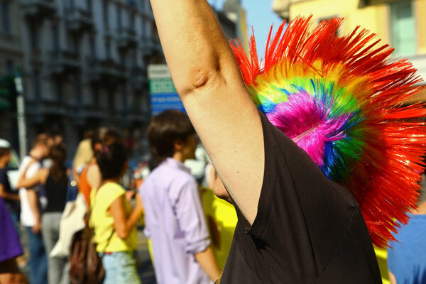 Woman with colorful haircut on gay parade