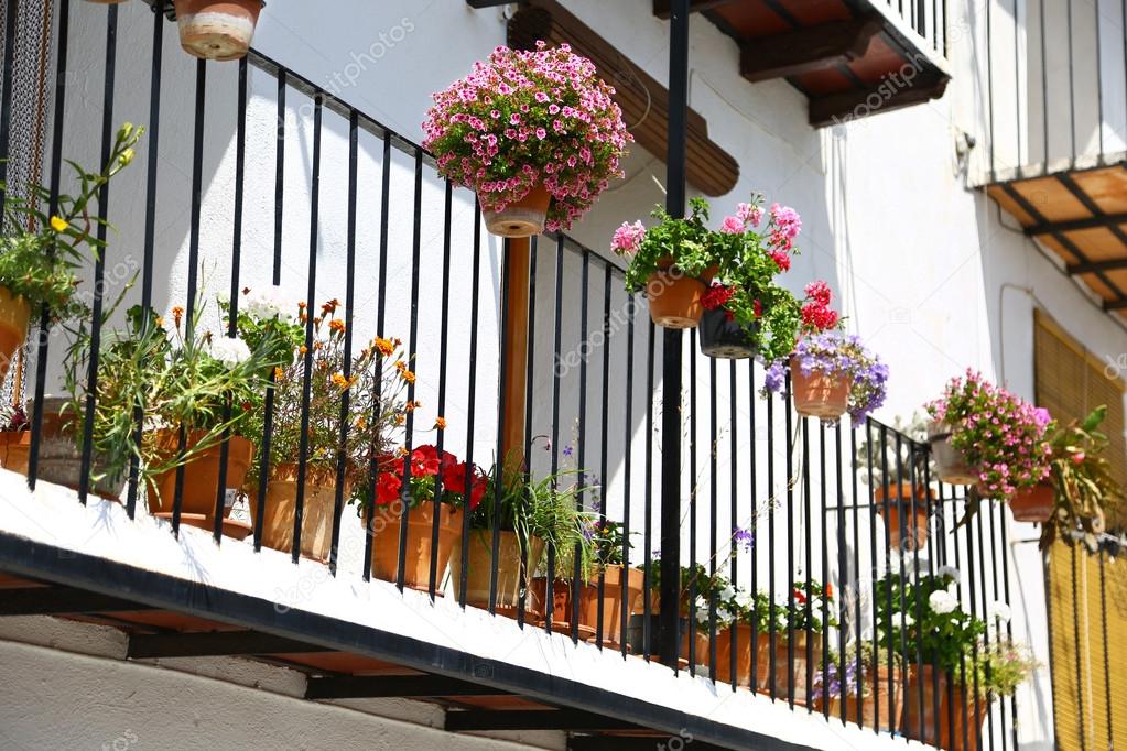 Balcony with flower pots in Andalusia