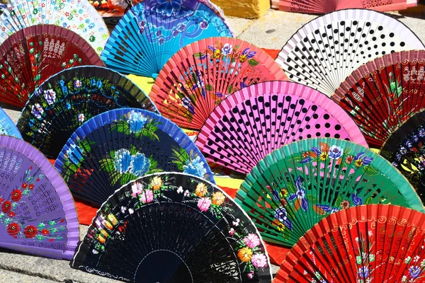 Multicolored fans on sale — Stock Photo, Image