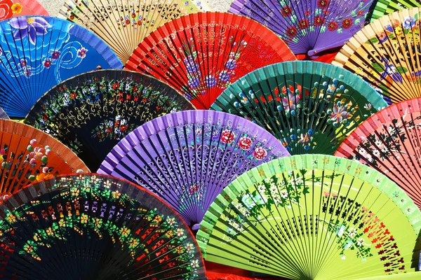 Multicolored fans on sale — Stock Photo, Image