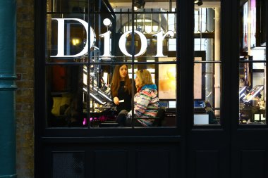 Facade window of  Dior store clipart