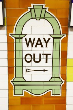 Painted sign in London underground