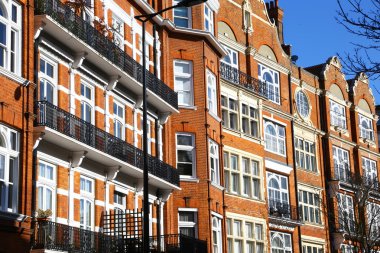 Victorian, red brick houses in London clipart