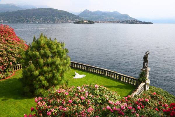Garden of Isola Bella with statue and fence, Borromean Islands, Italy
